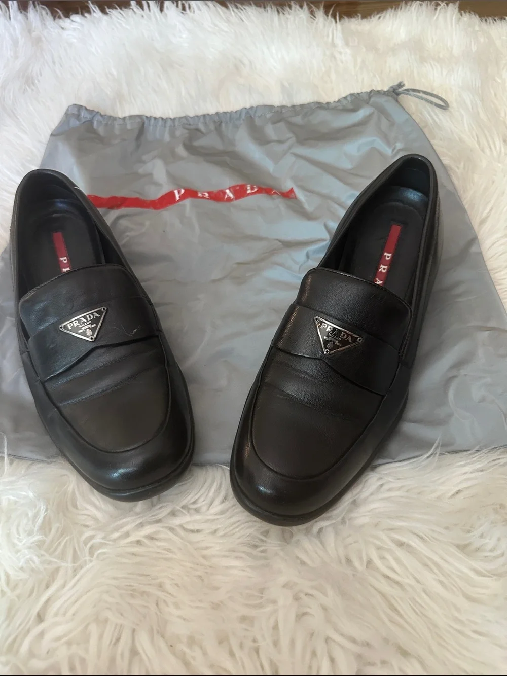 Prada Black Leather Slip-On Loafers with Triangular Logo
